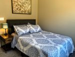 2nd guest bedroom with queen bed